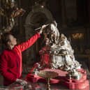 The team of experts take great care in dusting down and polishing the many historic collections stored at Blenheim Palace.