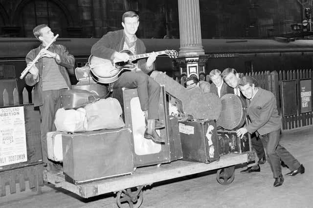 Sounds Incorporated - the band who made their reputation backing American singers including Little Ricahrd - arrive at Waverley Station in 1963.