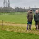 Cllr Martin Phillips, left, with Cllr Kieron Mallon at the new cricket grounds at Hanwell Fields