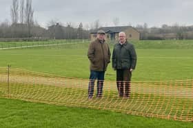 Cllr Martin Phillips, left, with Cllr Kieron Mallon at the new cricket grounds at Hanwell Fields