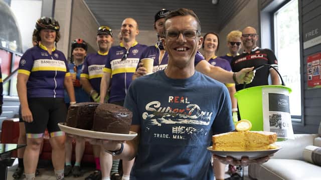 Rich Ivins serves coffee and cake to raise cash to meet his target for an epic alpine cycle ride