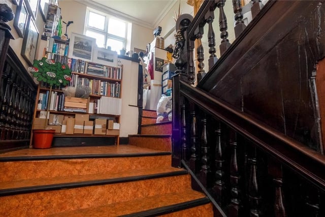 Large sweeping staircases give the property an elegant feel.