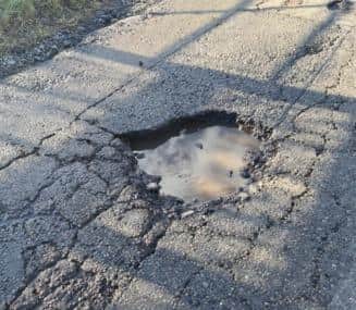 A deep pothole that has reportedly damaged cars on the Halse Road, near Brackley