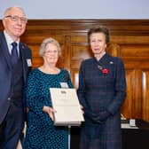 Dedicated volunteers Andy and Myrtle Darby receive their award from HRH The Princess Royal, President of the RYA.