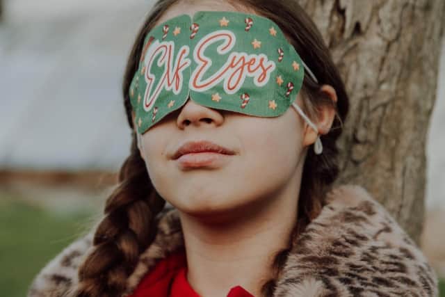 Siena Anderson modelling the Elf Eyes, self-heating children's eye mask