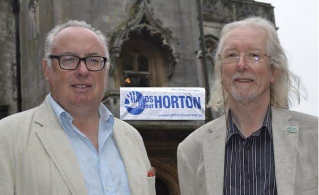 Banbury Town Council leader Cllr Kieron Mallon and Labour leader Cllr Steve Kilsby in front of the Hands Off the Horton banner at the town hall