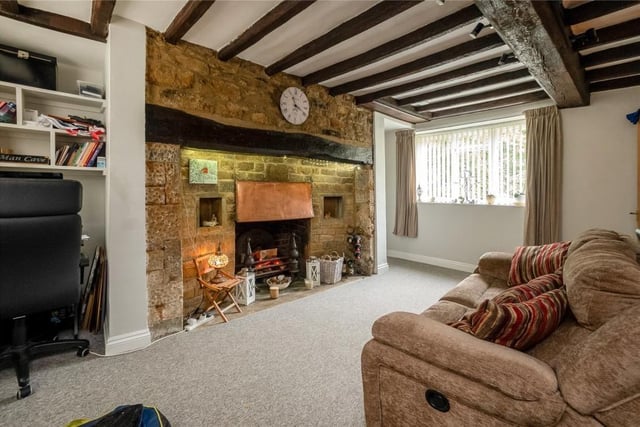 The cosy living room in the cottage property.