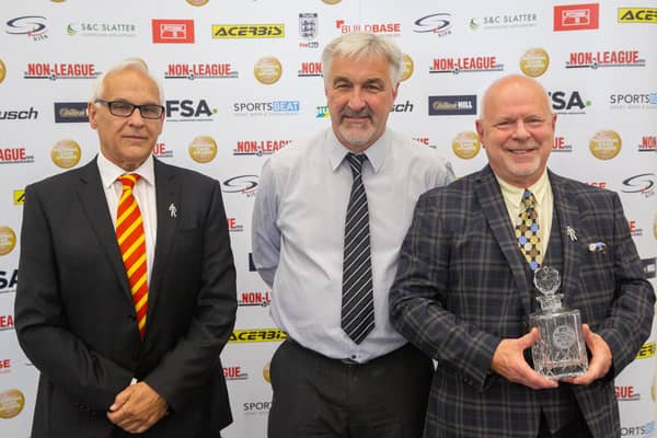 Ronnie Johnson collects the award for Banbury United - SK Kits Team of the Year