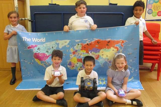 Wroxton CE Primary pupils celebrate a whole new world of learning thanks to Tesco shoppers.