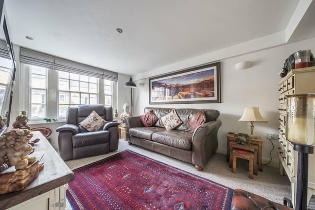 The property features a large living room space, ideal for hosting guests.