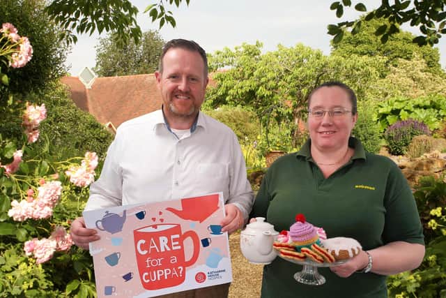 Phillip Handley and Sarah Young from Walraven get ready for their big bake off for Katharine House.