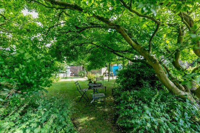 The cottage has a large mature garden with plenty of trees.