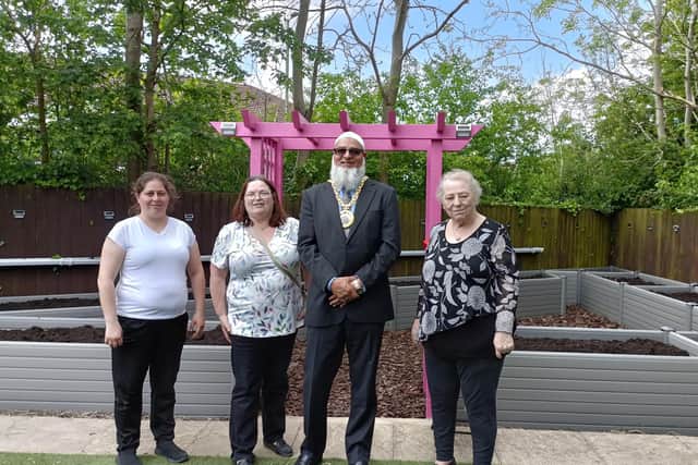 Some of the centre's volunteer team alongside the mayor, from left to right, Karen Beales, Gloria Clark, Fiaz Ahmed and Cicely Lewis.