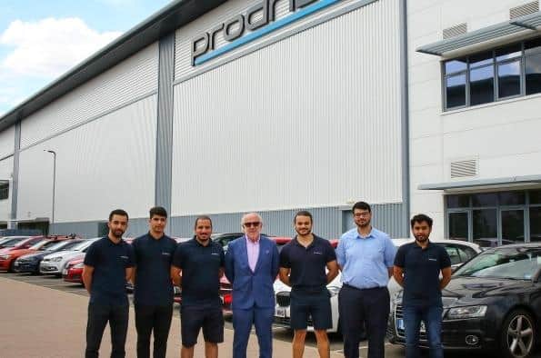 David Richards is pictured with the Bahraini students outside the Banbury Prodrive facility