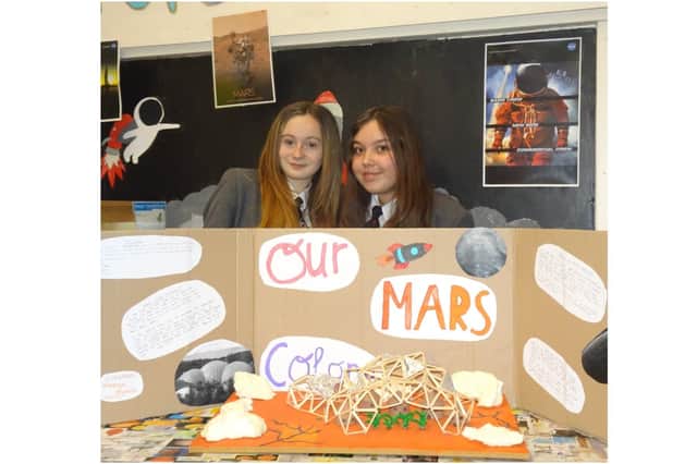 Sophia-Mai Whiteside and Daanya McCarroll were the overall winners of a space project at Wykham Park Academy in Banbury (photo from the school)