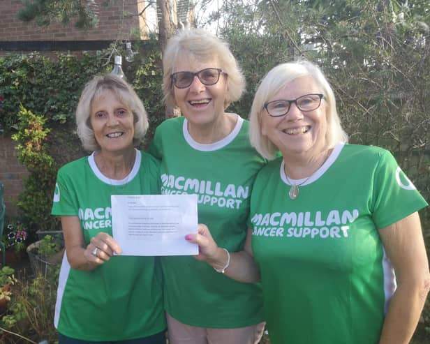 Three friends from Bodicote staged their own sponsored walk to raise more than £1,000 in aid of MacMillan Nurses.