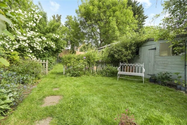 The rear garden, benefits from separate access via a private alleyway.