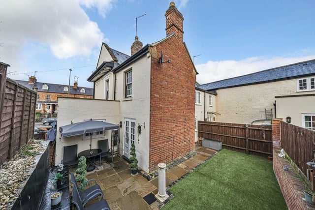 The property has a cosy garden with a section of concrete slabbed patio.