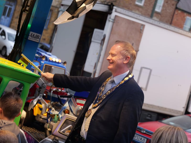 Cllr Nigel Simpson granting free rides to attendees at the fair.