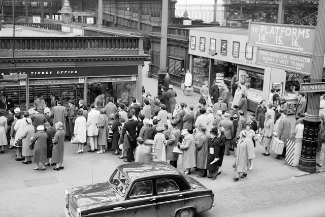 Holidaymakers queue for tickets during the Edinburgh Spring Holiday at Waverley Station in April 1961