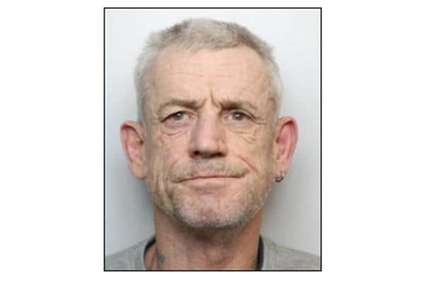 David Holland is wanted by the police for failing to appear in court last year.