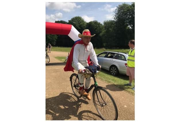 A Banbury man is taking on the Broughton Castle Sportive's 50-mile route dressed in his superhero outfit for The Let's Play Project.