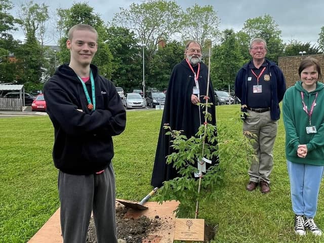 Left to right, Luke Twitchen, Rev Jeff West, Richard Moyle and Becky Skinner are pictured at the tree planting