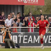 Adam Rooney and the Brackley Town fans show their delight after Alfie Bates' free-kick gave them the lead in Saturday's 1-1 draw with Alfreton Town, which was enough to ensure both clubs claimed a play-off place. Picture by Glenn Alcock
