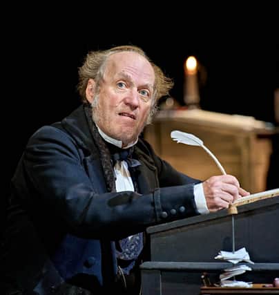 Ade Edmondson - the lynchpin for the large cast in the RSC's fabulous production of A Christmas Carol
