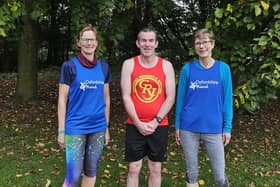 Warren Harrison alongside Oxfordshire Mind ambassadors and regular parkrun attendees Clare Boomer (left) and Clare Curnow.