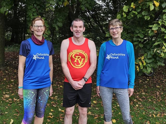 Warren Harrison alongside Oxfordshire Mind ambassadors and regular parkrun attendees Clare Boomer (left) and Clare Curnow.