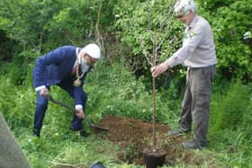 Banbury town mayor Fiaz Ahmed planting the tree with chair of the Salt Way Action Group David Russell.