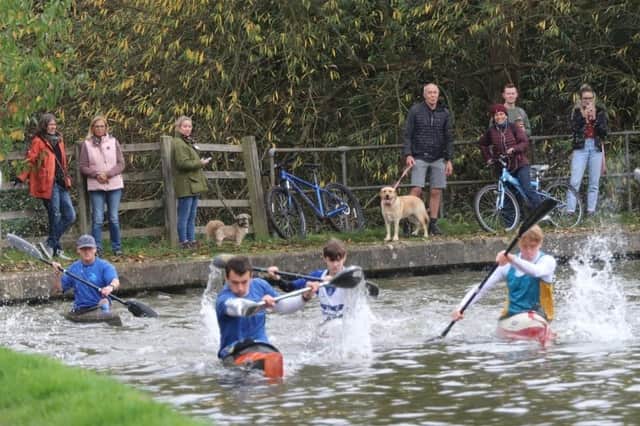 Over 140 kayakers took to Banbury's canal for marathon paddle race.