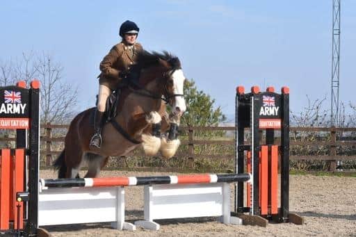 Kate has rediscovered her passion for horse riding and jumping since joining the Army Reserves.