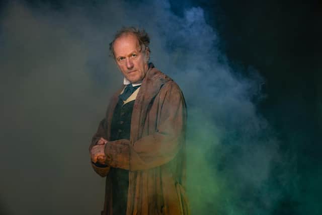 Ade Edmondon is Scrooge in the RSC's 2022 production of A Christmas Carol