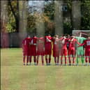 Easington Sports FC players observe a minute’s silence for Esme before their match against Northampton Chenecks on Saturday, October 10. (Photo credit Megan Bottoms)