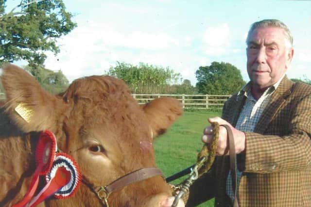 Peter Smith with the 50,000gns Bailea Umandy which produced a number of influential progeny for his Ironstone Limousin herd