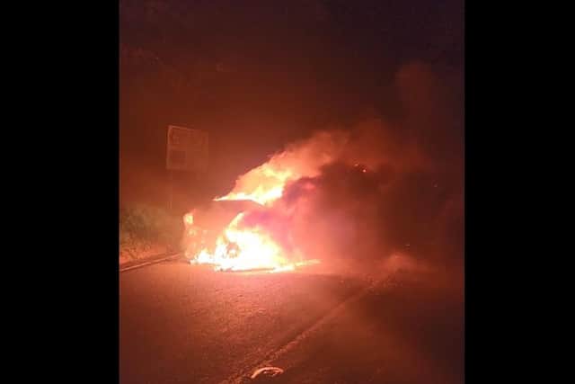 The other car involved in the Robarts crash burst into flames shortly after the dramatic accident.