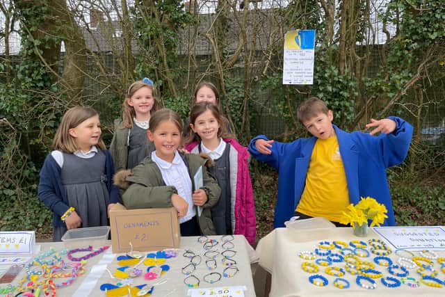 Hook Norton Primary School children raised money for Ukraine by selling cakes and bracelets. Photo supplied by the school.