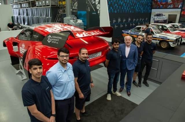 David Richards is pictured with his protegees from Bahrain at the Prodrive factory