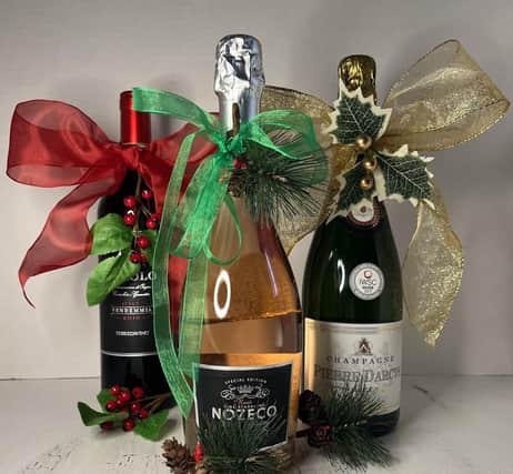 Big Red Bow's gift wrapping services makes a gift of bottles extra special