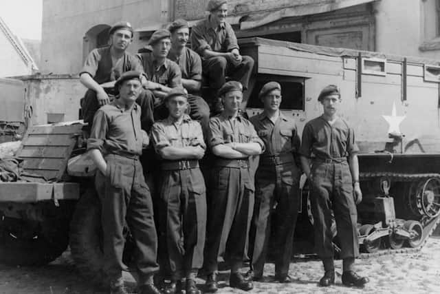 Nathaniel Fiennes, second from left, bottom row, with his men in France during the war