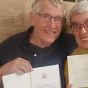 Linden and Jean Burtonwood proudly displaying their congratulation letter from King Charles and the Queen Consort Camilla.