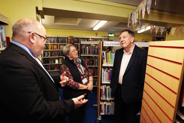 Cllr Neil Fawcett, Oxfordshire County Council’s cabinet member for community and corporate services (left), with minister for data and digital infrastructure Sir John Whittingdale MP, and Anne Manwaring (group library manager), at Milton-Under-Wychwood Library.