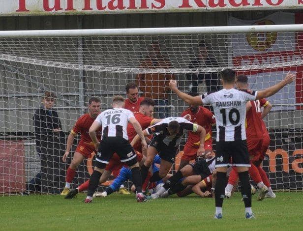 Goalmouth action from Banbury United's 3-0 defeat to Spennymoor Town on the opening day of the season. Picture by Julie Hawkins