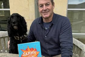 Author and racehorse trainer Charlie Brookes, with Mildred the setter-poo who is the inspiration behind his new children's book