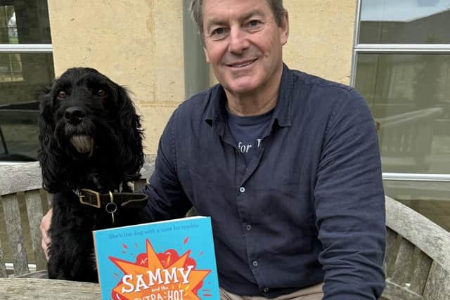 Author and racehorse trainer Charlie Brookes, with Mildred the setter-poo who is the inspiration behind his new children's book