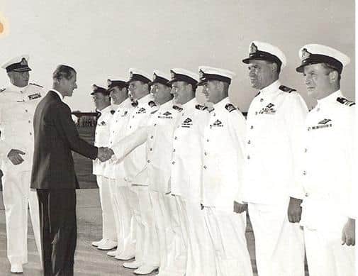 Vyvian Howard (far end) being introduced to the Duke of Edinburgh on the HMS Eagle in 1956