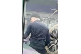 Police have released an image of a man they wish to speak to regarding the theft of a Land Rover spare wheel.