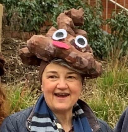 One of the demonstrators wearing a 'poo' hat to signify the raw sewage being discharged into the River Cherwell and Oxford Canal